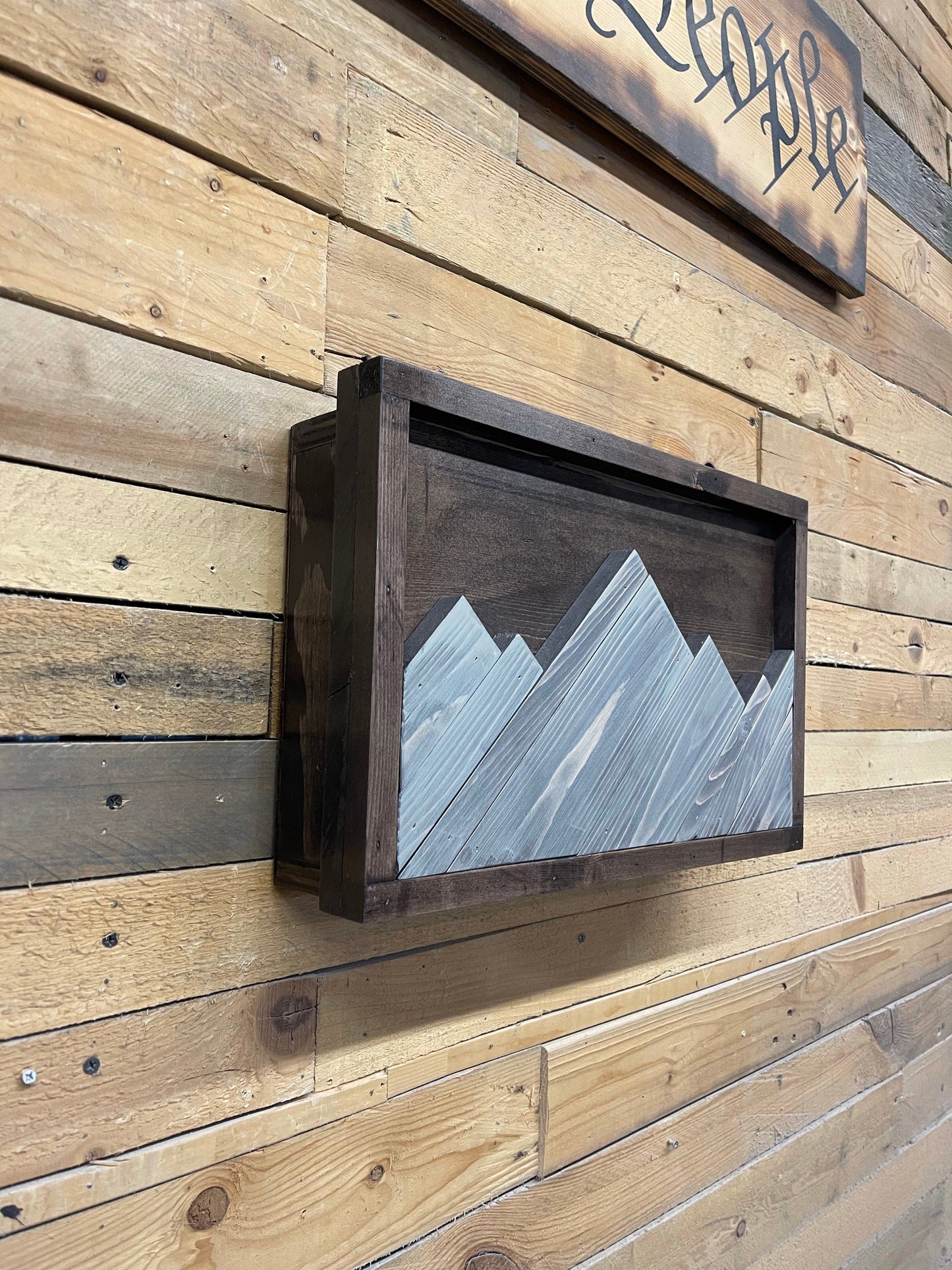 Mountain hidden gun decor
