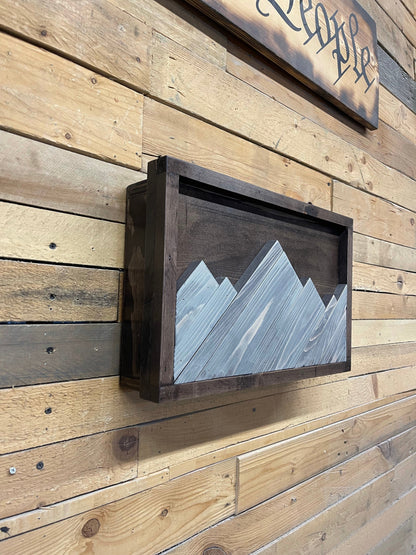 Mountain hidden gun decor